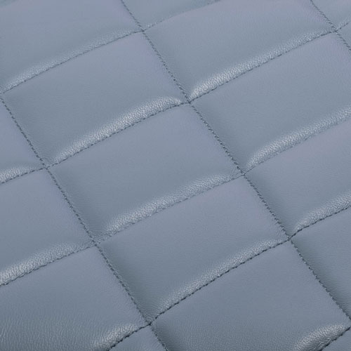 Grain fin matelassé